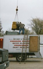 genset going in thru roof2.jpg