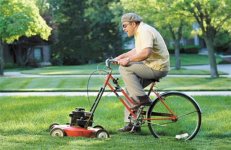 guy-riding-bicycle-lawnmower (Medium).jpg