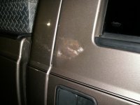 truck damage rock thrown from roadside 001.jpg