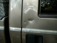 truck damage rock thrown from roadside 002.jpg